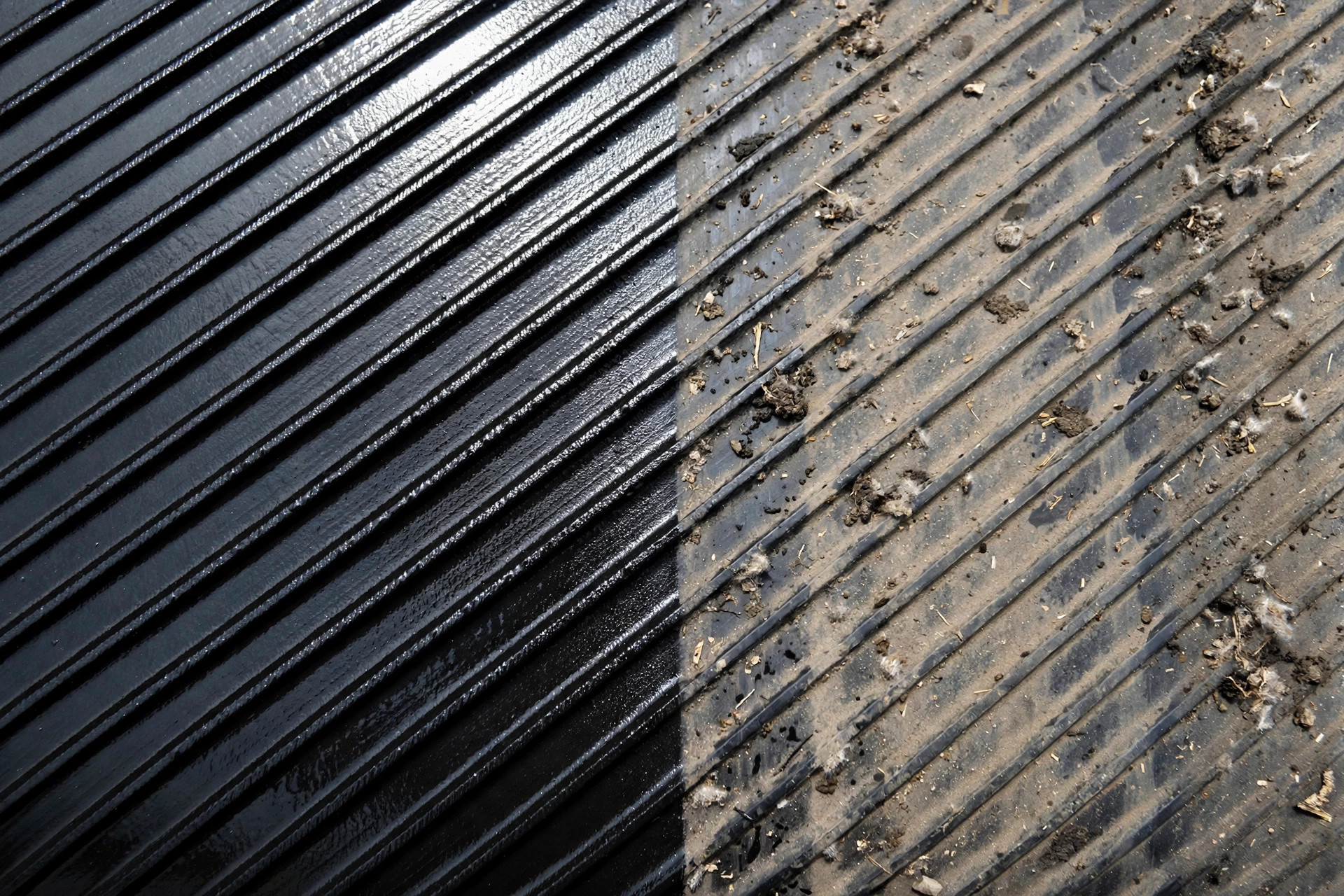 Close-up of conveyor belt surface, clean versus dirty